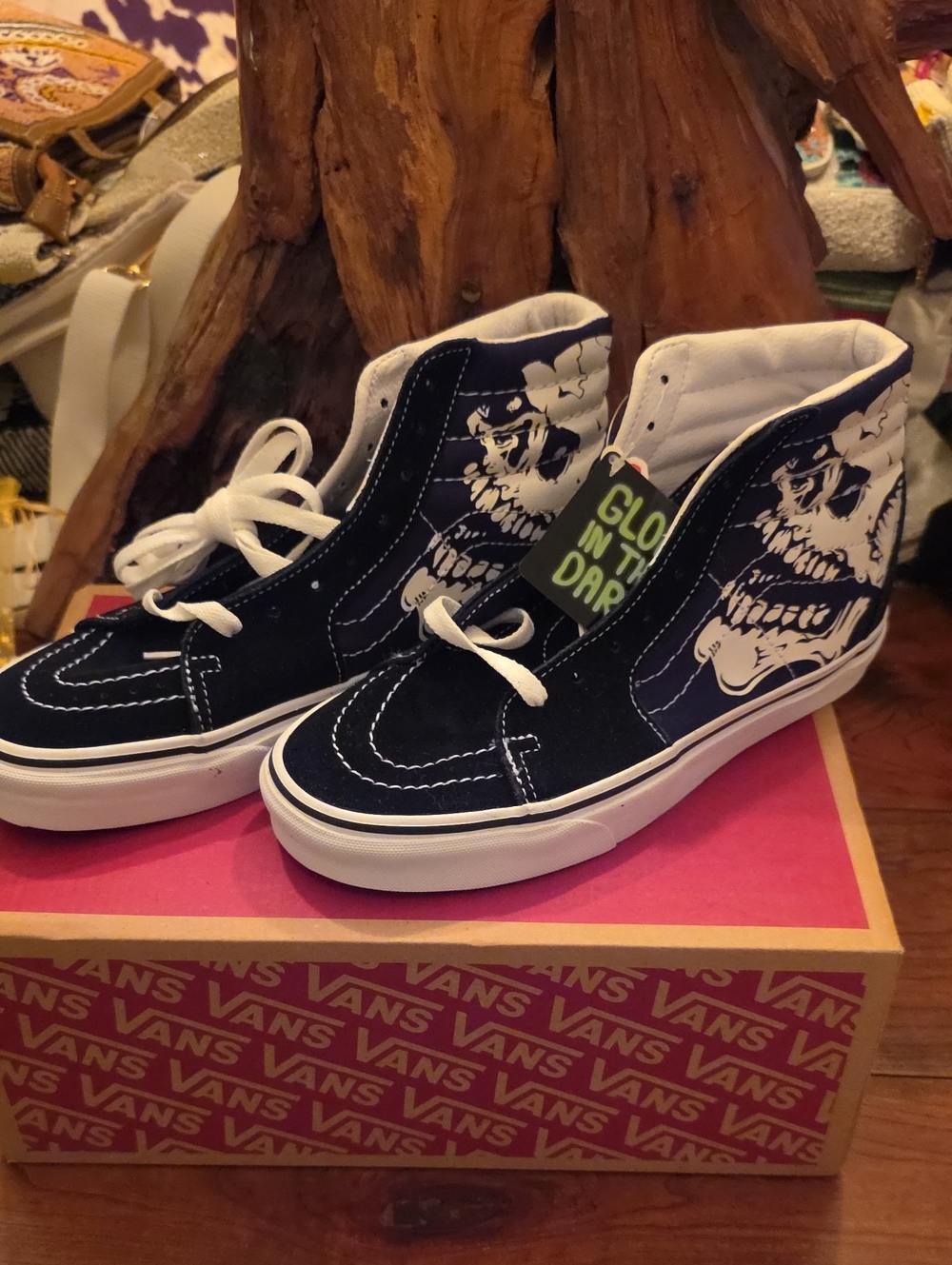 Vans Black and White High-Top Skate Sneakers with Skull Graphic